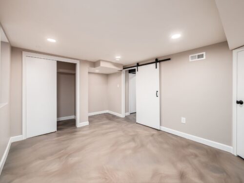 Basement remodel with egress window and simple epoxy floors