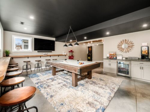 Basement remodel with snack bar and sprawling billiards bar ledge 2