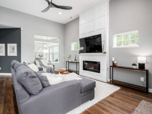 wainscotting and accent walls and the rug that ties the room together