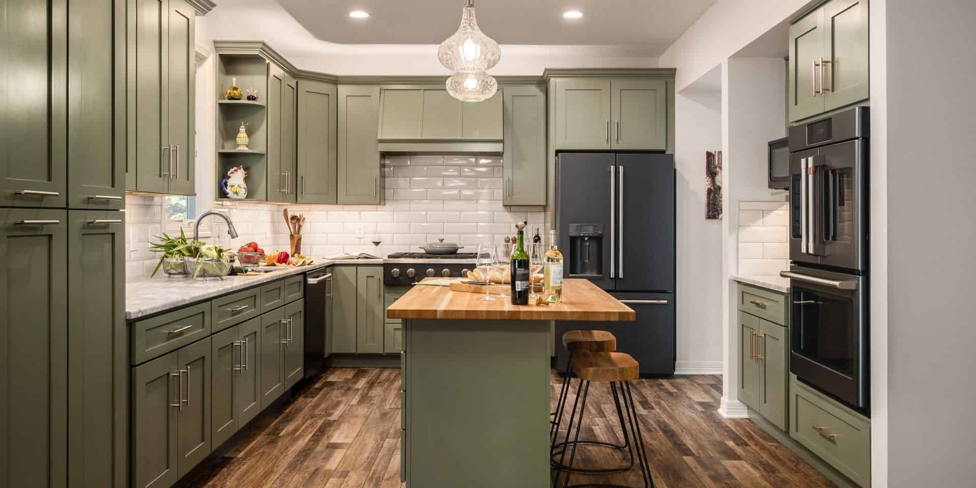 kitchen remodel with upscale green cabinetry and natural tones