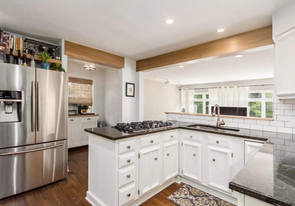 Kitchen Remodel with dark Ceiling Beams